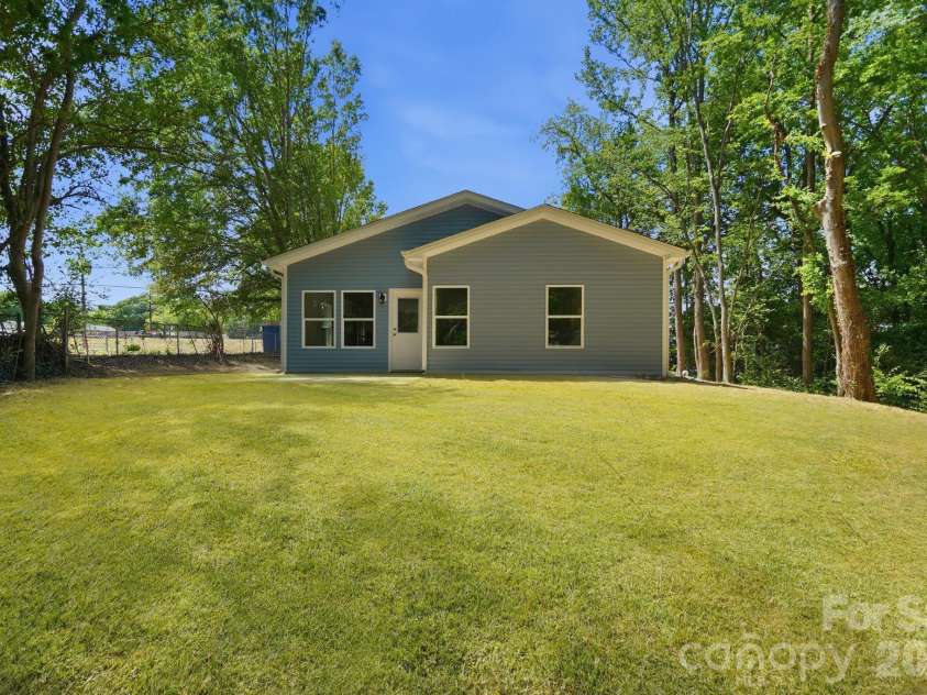 1150 Sloop Avenue, Kannapolis, NC 28083.  MLS# CAR4369219, YatesRealty ID 22923. Private Backyard