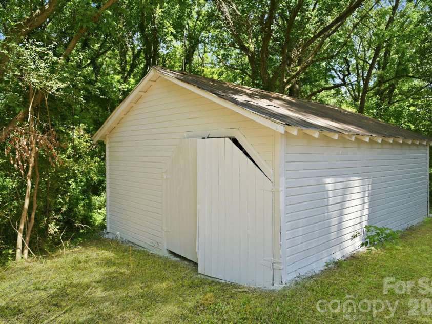 1150 Sloop Avenue, Kannapolis, NC 28083.  MLS# CAR4369219, YatesRealty ID 22923. Private Backyard w/ Detached Shed/Garage