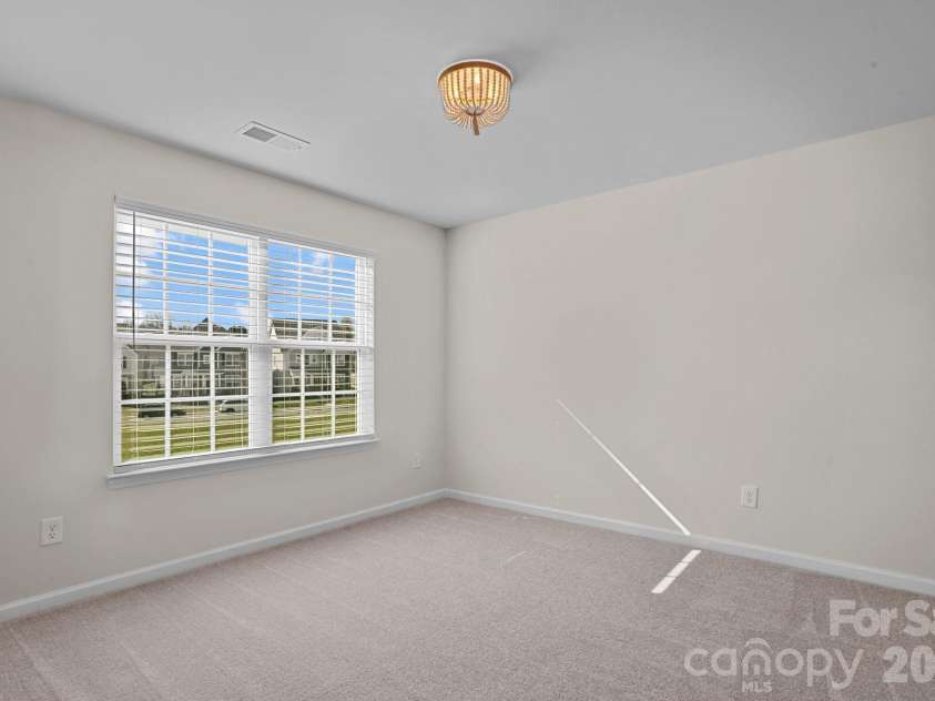 15721 White Quartz Lane, Davidson, NC 28036.  MLS# CAR4351942, YatesRealty ID 22924. Secondary bedroom