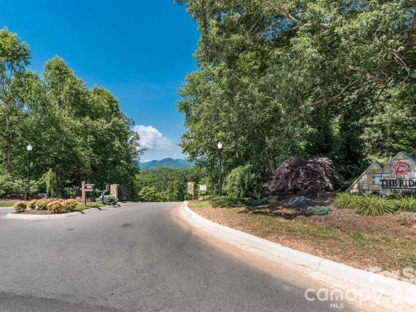 31 Grizzly Drive, Leicester, NC 28748.  MLS# CAR4366099, YatesRealty ID 22932. Community Entrance 