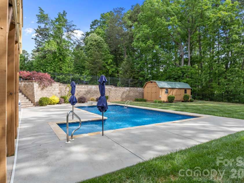 141 Winding Creek Drive, Troutman, NC 28166.  MLS# CAR4353880, YatesRealty ID 22933. Dive In!ALSO -8x8 Tanning ledge