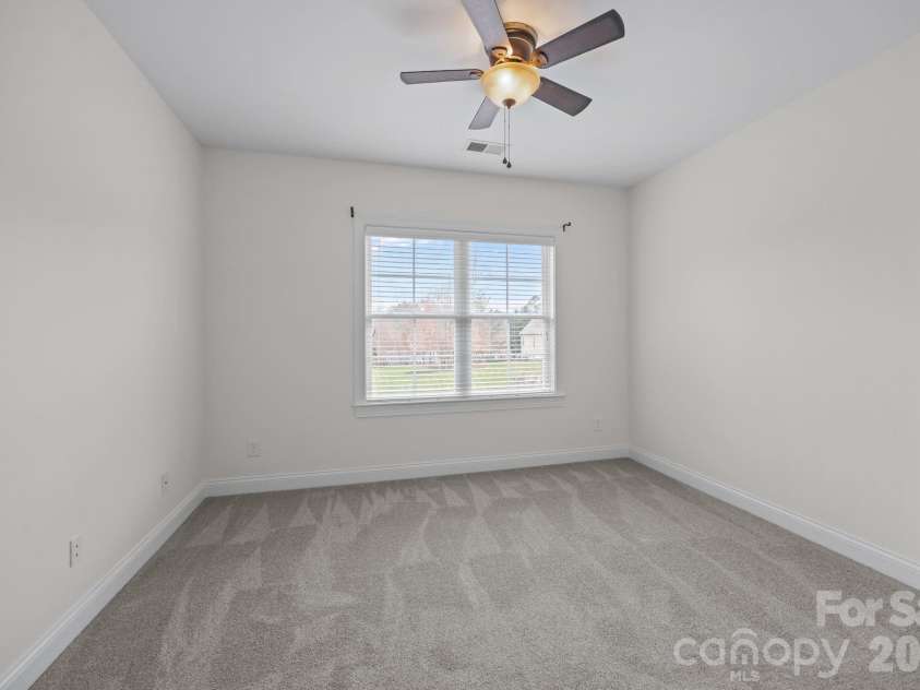 141 Winding Creek Drive, Troutman, NC 28166.  MLS# CAR4353880, YatesRealty ID 22933. Upper level bedroom - this would be the 3rd bedroom