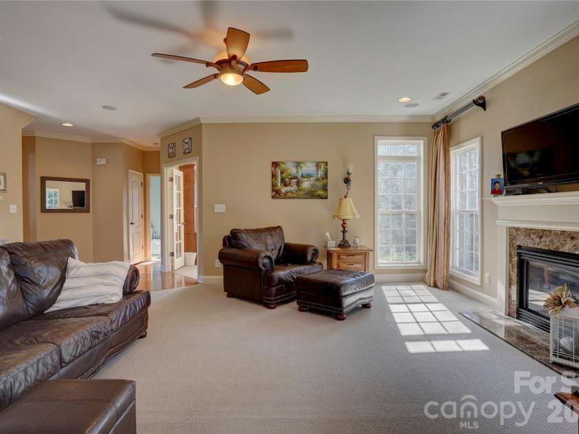 15100 Durmast Court, Mint Hill, NC 28227.  MLS# CAR4373176, YatesRealty ID 22935. Oversized Living Room with Fireplace