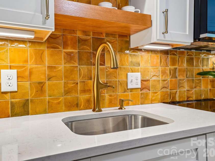 109 Liberty Street, Asheville, NC 28801.  MLS# CAR4374885, YatesRealty ID 22936. Kitchen Sink & Handmade Tile Backsplash