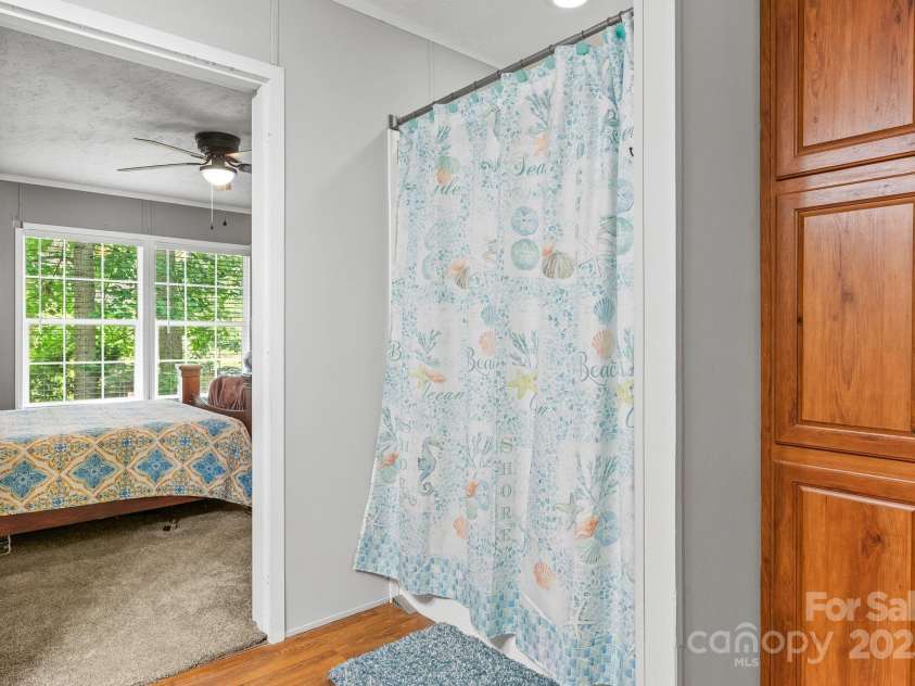27 Sage Way, Clyde, NC 28721.  MLS# CAR4272722, YatesRealty ID 22936. Primary bathroom also offers a shower.