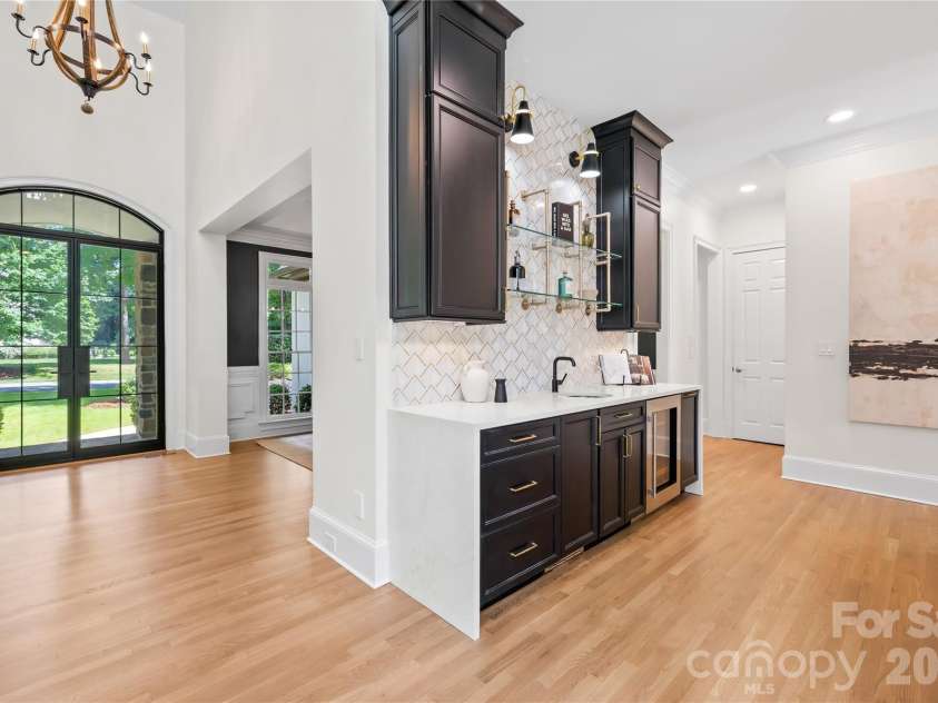 162 Dedham Loop, Mooresville, NC 28117.  MLS# CAR4378074, YatesRealty ID 22938. Bar built for entertaining