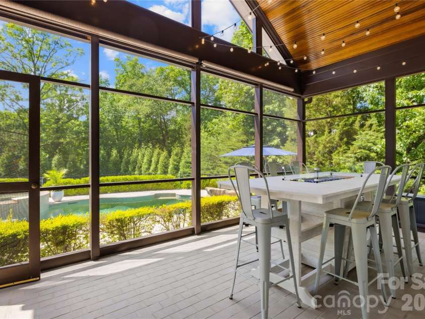162 Dedham Loop, Mooresville, NC 28117.  MLS# CAR4378074, YatesRealty ID 22938. Covered patio overlooking the pool & spa
