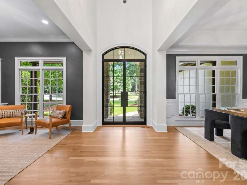 162 Dedham Loop, Mooresville, NC 28117.  MLS# CAR4378074, YatesRealty ID 22938. Gorgeous custom iron front door and newly refinished hardwoods