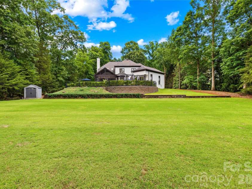 162 Dedham Loop, Mooresville, NC 28117.  MLS# CAR4378074, YatesRealty ID 22938. HUGE, private backyard surrounded by mature trees!