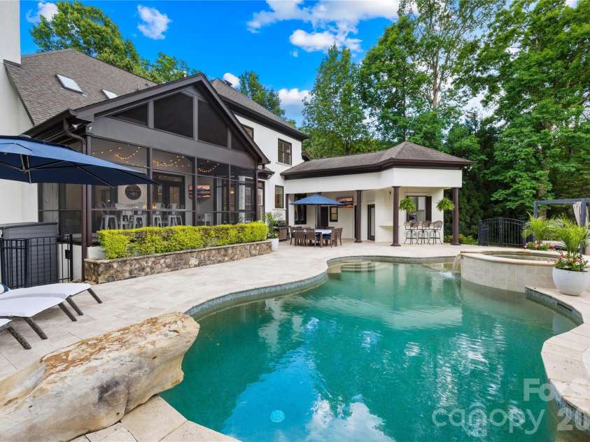 162 Dedham Loop, Mooresville, NC 28117.  MLS# CAR4378074, YatesRealty ID 22938. Resort-style backyard amenities!