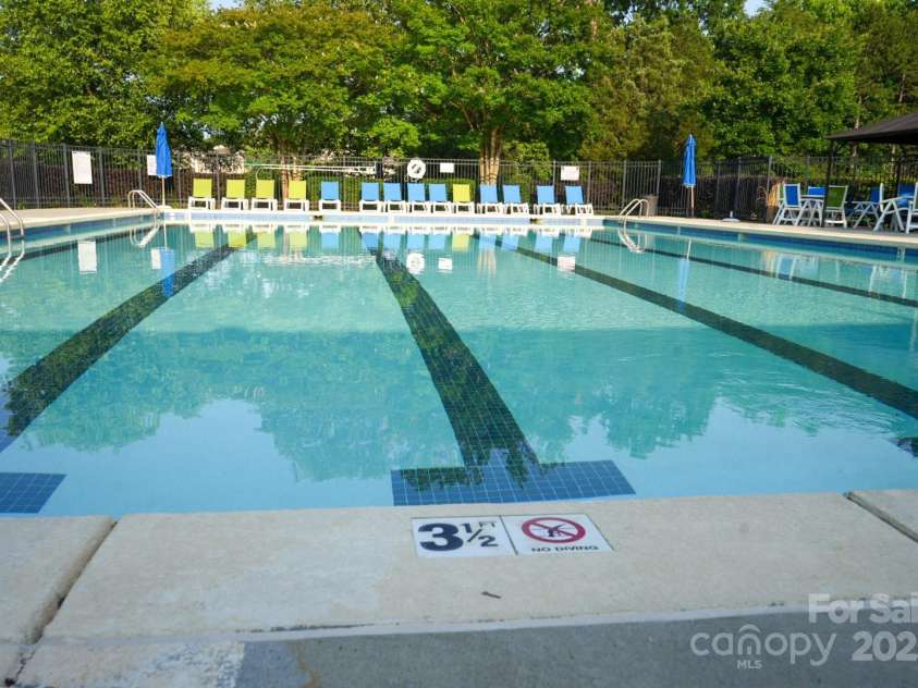 14411 Glendon Hall Lane, Charlotte, NC 28262.  MLS# CAR4268955, YatesRealty ID 22941. Community Pool