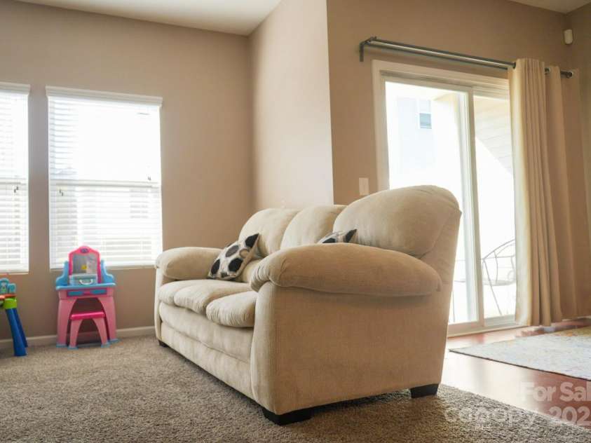 14411 Glendon Hall Lane, Charlotte, NC 28262.  MLS# CAR4268955, YatesRealty ID 22941. Living Room View