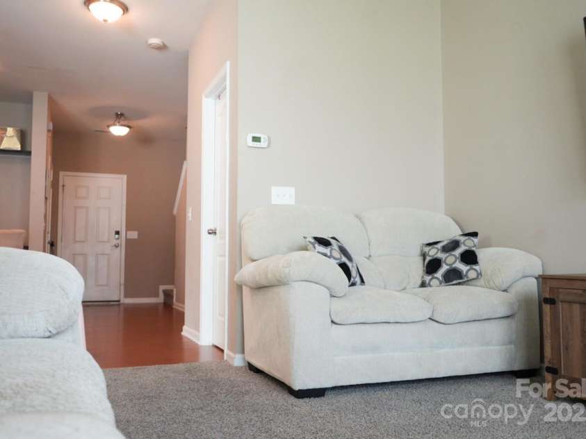 14411 Glendon Hall Lane, Charlotte, NC 28262.  MLS# CAR4268955, YatesRealty ID 22941. Living Room View