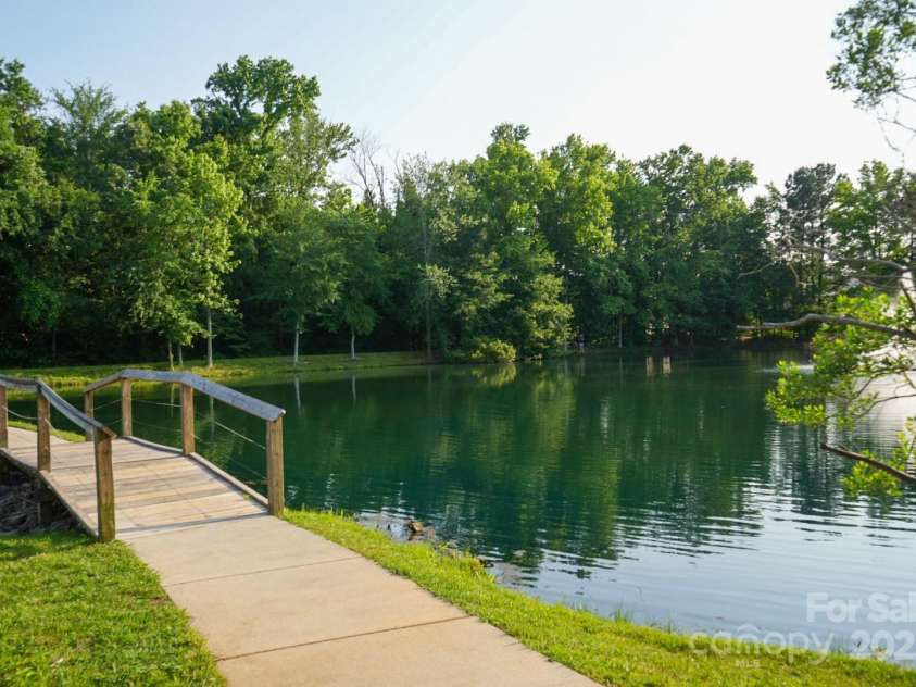 14411 Glendon Hall Lane, Charlotte, NC 28262.  MLS# CAR4268955, YatesRealty ID 22941. Pond