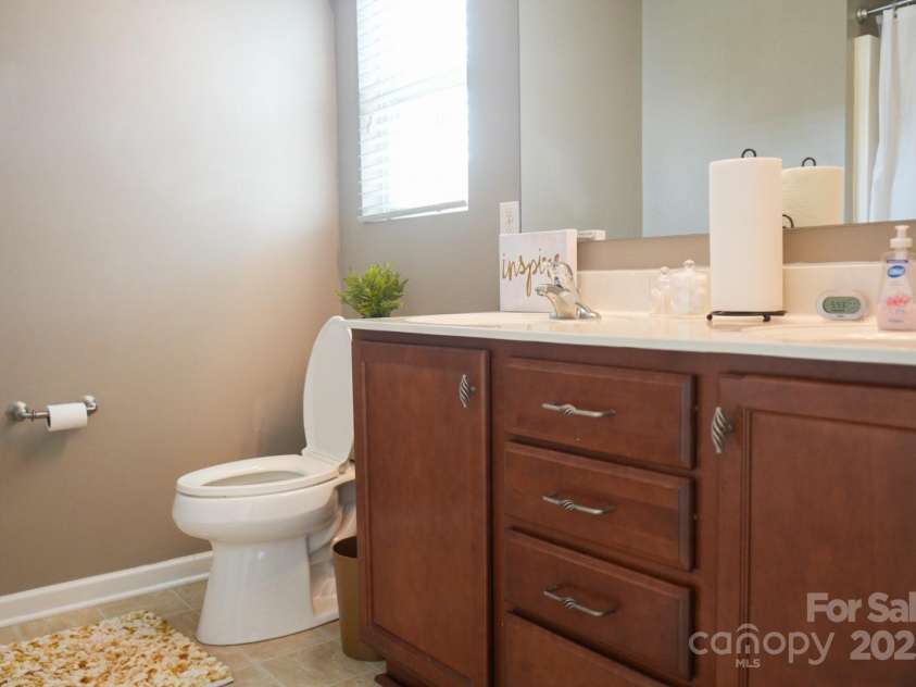 14411 Glendon Hall Lane, Charlotte, NC 28262.  MLS# CAR4268955, YatesRealty ID 22941. Primary Bathroom