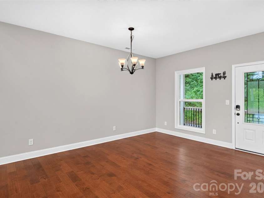 771 Sally Gap Road, Old Fort, NC 28762.  MLS# CAR4399905, YatesRealty ID 22941. Dining table area.