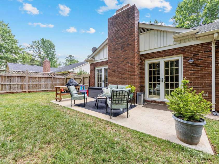 1115 Berry Ridge Road, Charlotte, NC 28270.  MLS# CAR4274309, YatesRealty ID 22944. Concrete patio for lounging or entertaining!
