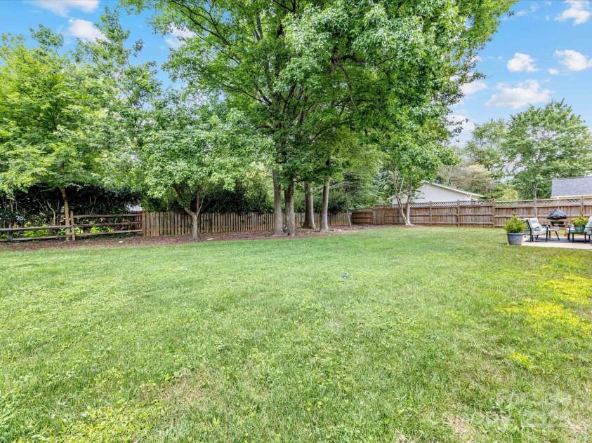 1115 Berry Ridge Road, Charlotte, NC 28270.  MLS# CAR4274309, YatesRealty ID 22944. Large open and FLAT backyard!