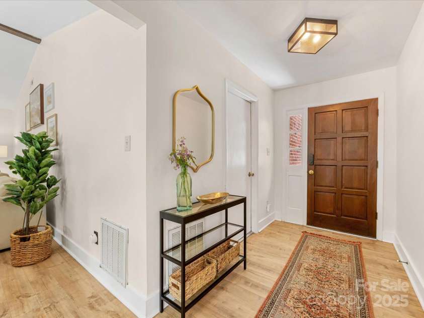 1115 Berry Ridge Road, Charlotte, NC 28270.  MLS# CAR4274309, YatesRealty ID 22944. The 2-car attached garage is just to the left of the entryway