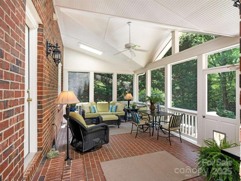 4026 Sharon View Road, Charlotte, NC 28226.  MLS# CAR4266145, YatesRealty ID 22945. Screened Porch overlooks patio & private fenced yard