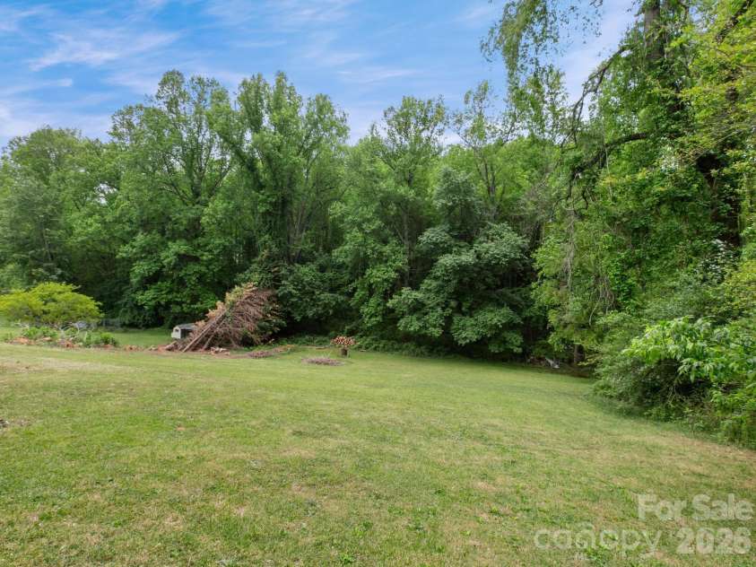 38 Brown Lynch Road, Candler, NC 28715.  MLS# CAR4377912, YatesRealty ID 22946. Back Yard