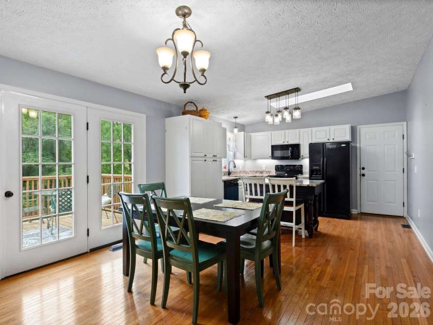 38 Brown Lynch Road, Candler, NC 28715.  MLS# CAR4377912, YatesRealty ID 22946. Dining Area + Kitchen