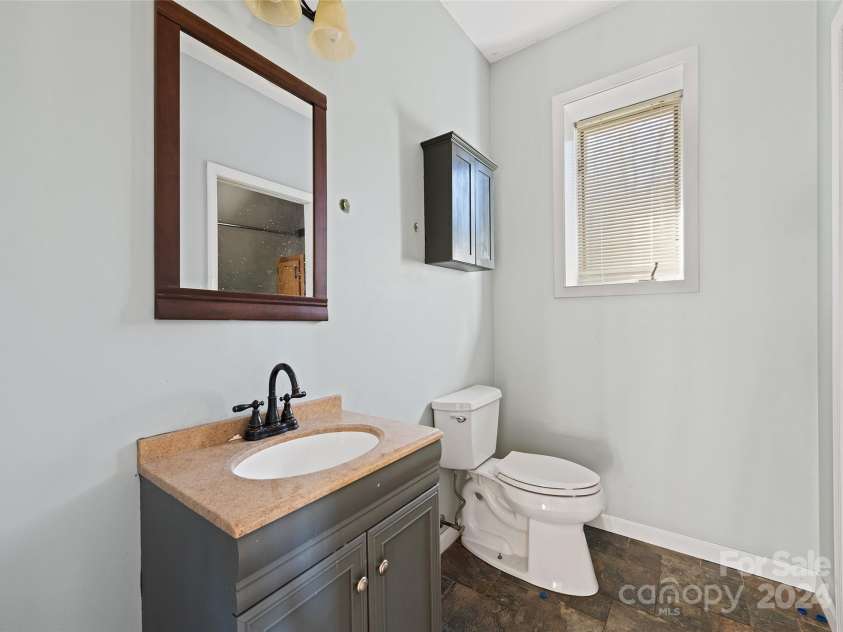 31 Lowe Drive, Waynesville, NC 28786.  MLS# CAR4203338, YatesRealty ID 2296. 1/2 Bath- Main Floor