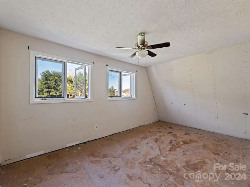 31 Lowe Drive, Waynesville, NC 28786.  MLS# CAR4203338, YatesRealty ID 2296. 2cd Floor Bedroom #1 -Reno