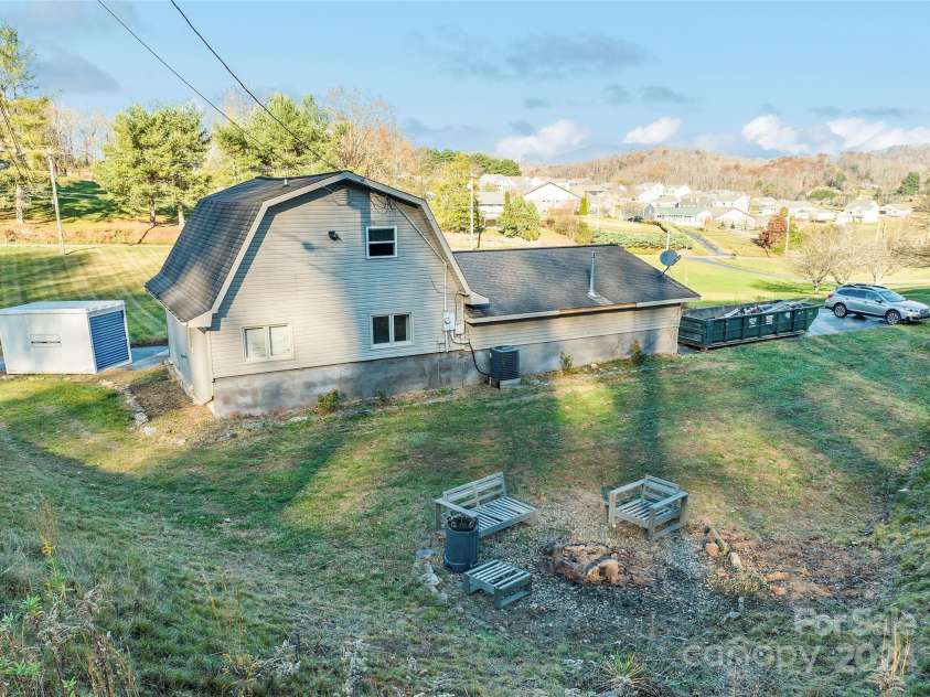 31 Lowe Drive, Waynesville, NC 28786.  MLS# CAR4203338, YatesRealty ID 2296. Back Yard - Fire Pit