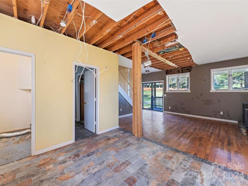 31 Lowe Drive, Waynesville, NC 28786.  MLS# CAR4203338, YatesRealty ID 2296. Kitchen, Laundry- Main Floor