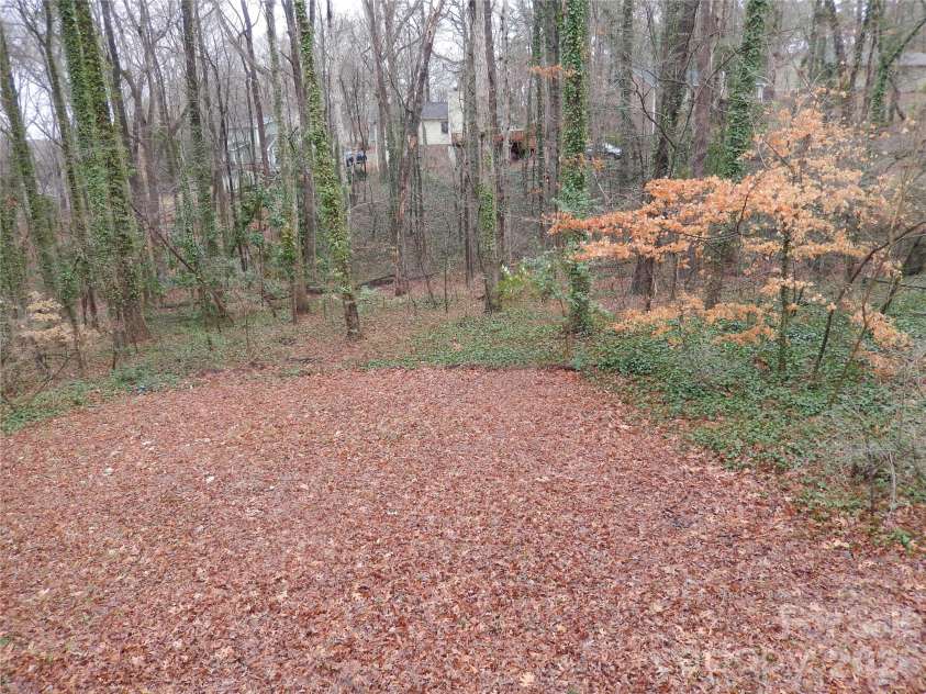 547 Brent Road, Raleigh, NC 27606.  MLS# CAR4350457, YatesRealty ID 2296. Rear yard