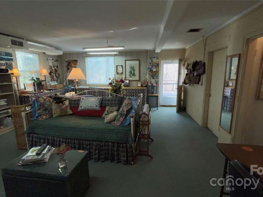 700 Valleyview Drive, Albemarle, NC 28001.  MLS# CAR4258028, YatesRealty ID 22960. Basement family room