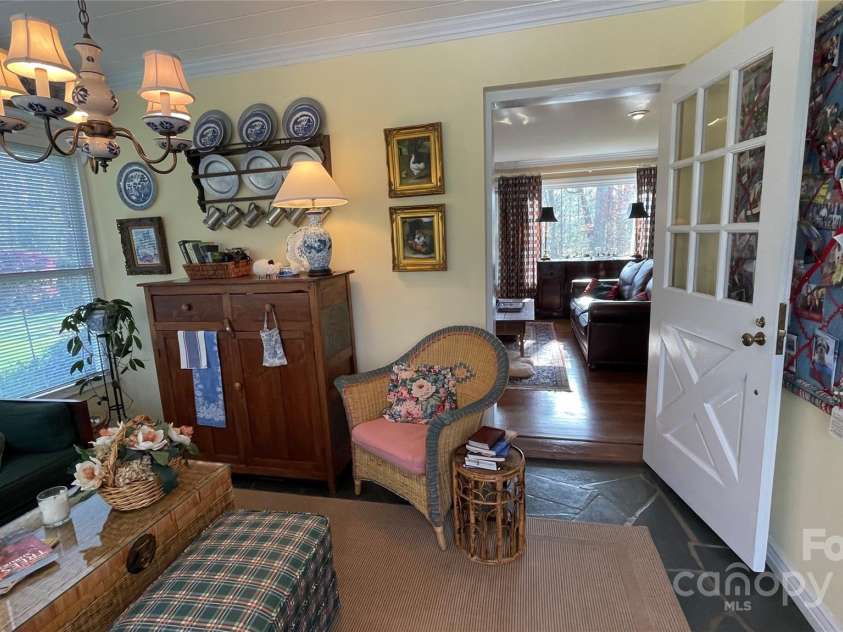700 Valleyview Drive, Albemarle, NC 28001.  MLS# CAR4258028, YatesRealty ID 22960. Living room entrance to sunroom