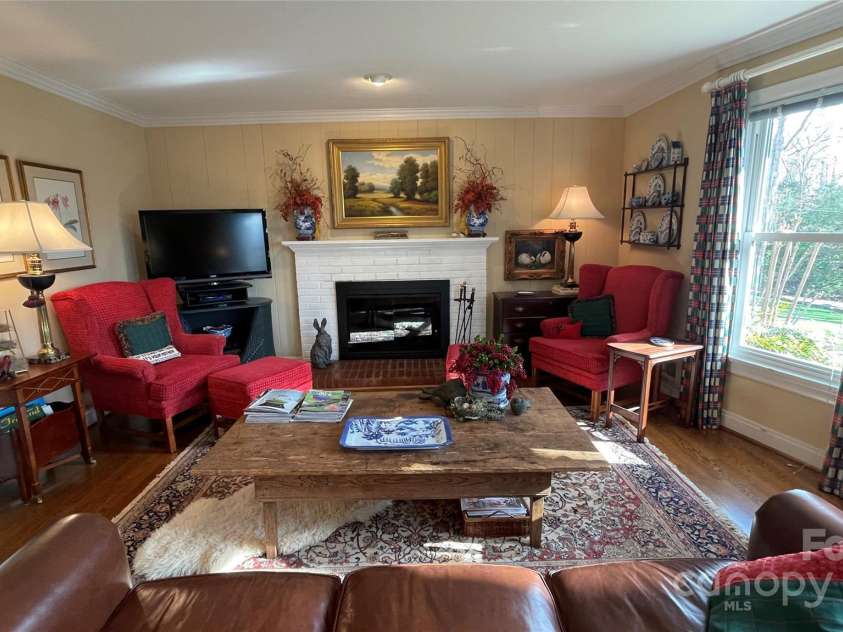 700 Valleyview Drive, Albemarle, NC 28001.  MLS# CAR4258028, YatesRealty ID 22960. Living room with picture window and fireplace