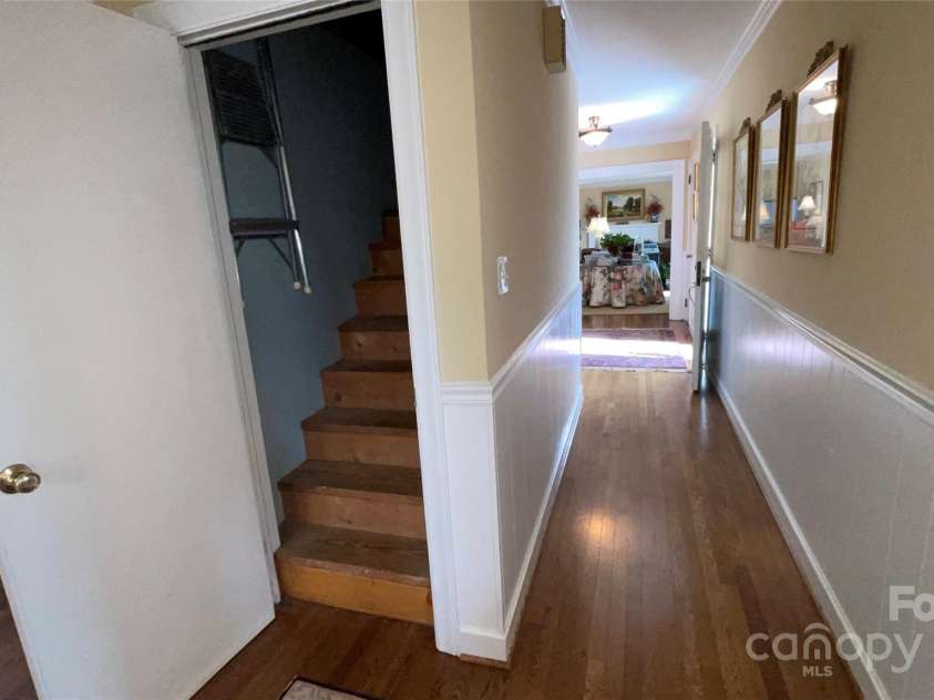 700 Valleyview Drive, Albemarle, NC 28001.  MLS# CAR4258028, YatesRealty ID 22960. Stairs to attic from main floor