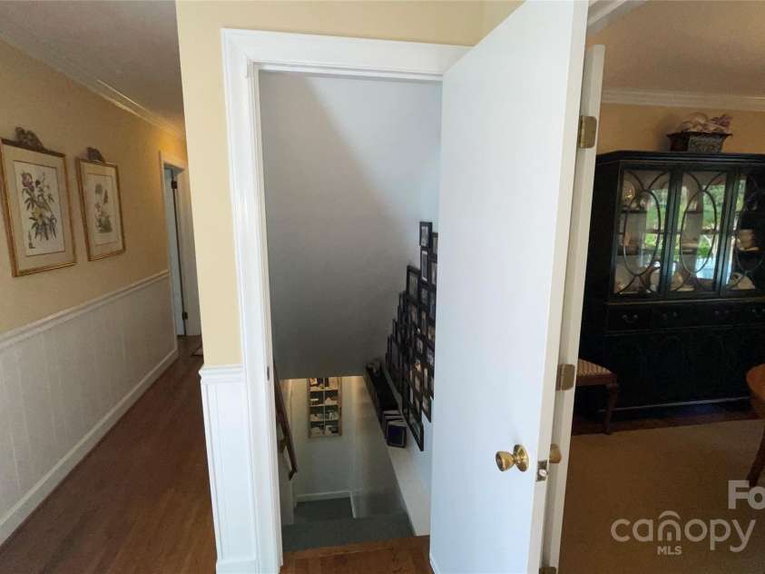 700 Valleyview Drive, Albemarle, NC 28001.  MLS# CAR4258028, YatesRealty ID 22960. Stairs to basement family room