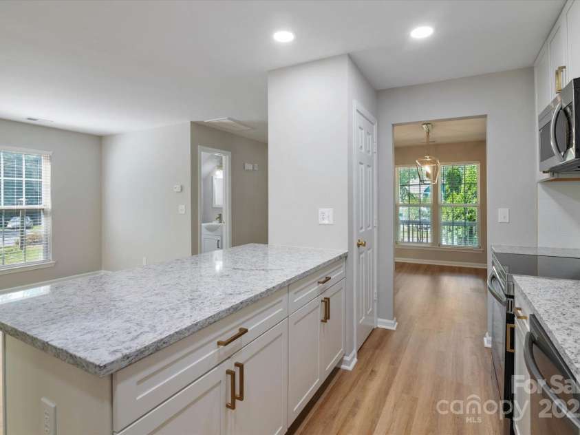 8343 Highlander Court, Charlotte, NC 28269.  MLS# CAR4273780, YatesRealty ID 22964. Large Kitchen Island With Plenty Of Storage!