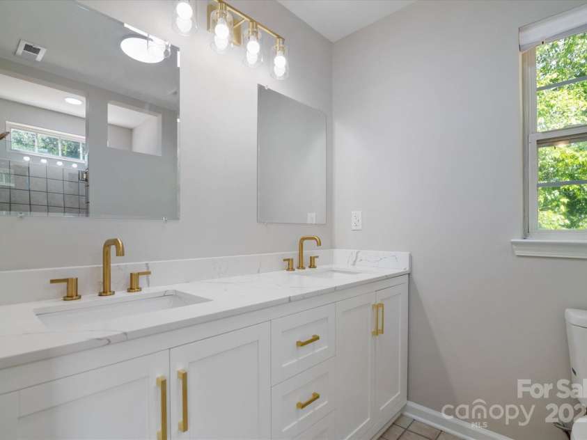 8343 Highlander Court, Charlotte, NC 28269.  MLS# CAR4273780, YatesRealty ID 22964. Large Primary Ensuite Bath With New Dual Vanity!