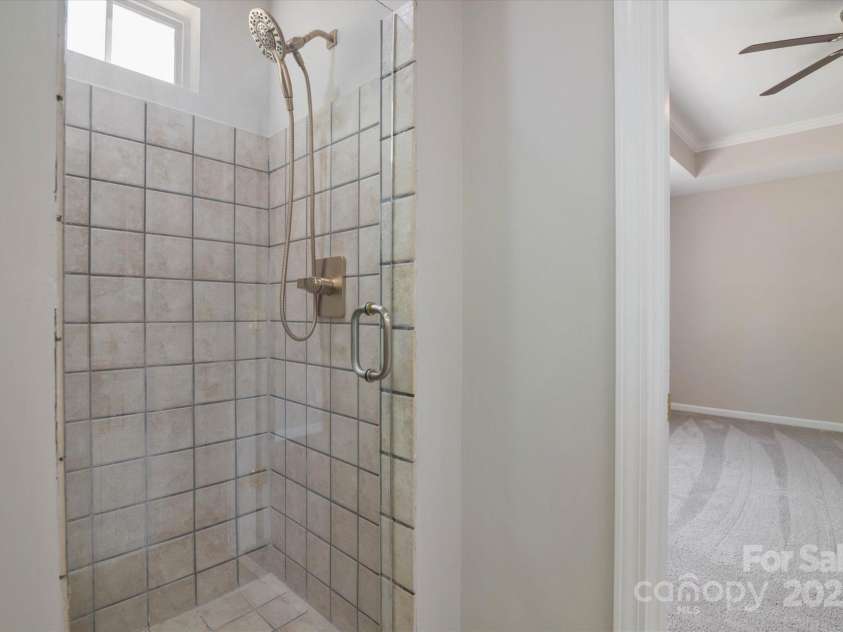 8343 Highlander Court, Charlotte, NC 28269.  MLS# CAR4273780, YatesRealty ID 22964. Tiled Dual Shower System!