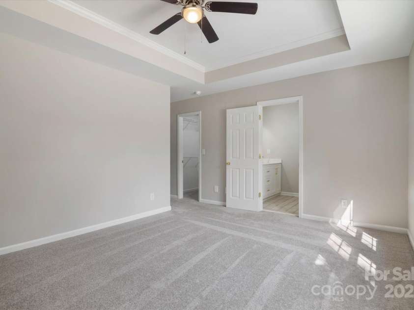 8343 Highlander Court, Charlotte, NC 28269.  MLS# CAR4273780, YatesRealty ID 22964. Tray Ceiling With Ceiling Fan For Comfort!