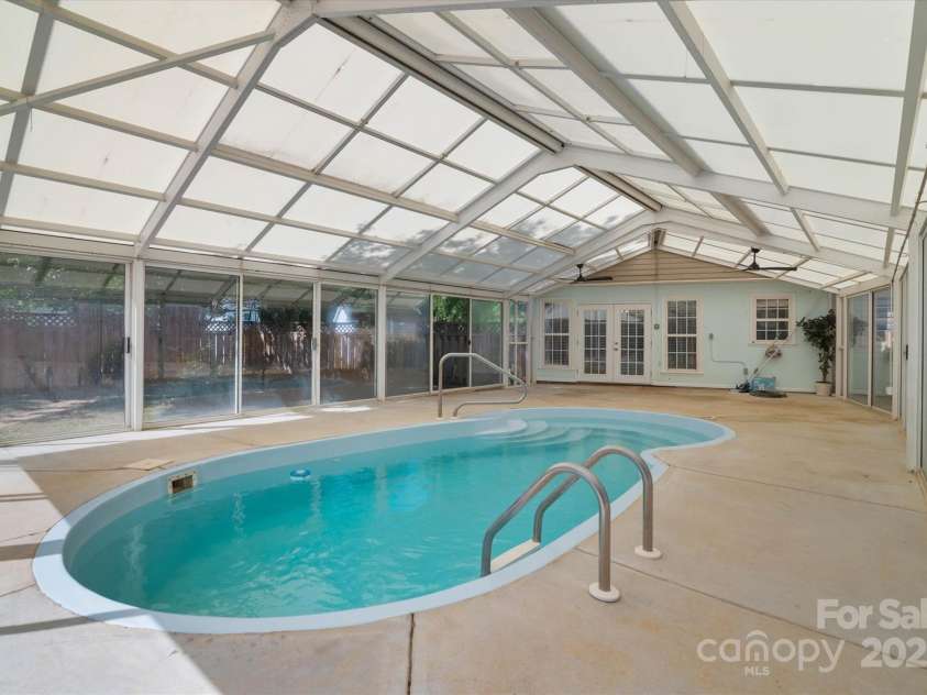 8343 Highlander Court, Charlotte, NC 28269.  MLS# CAR4273780, YatesRealty ID 22964. Year Round Entertainment Area!