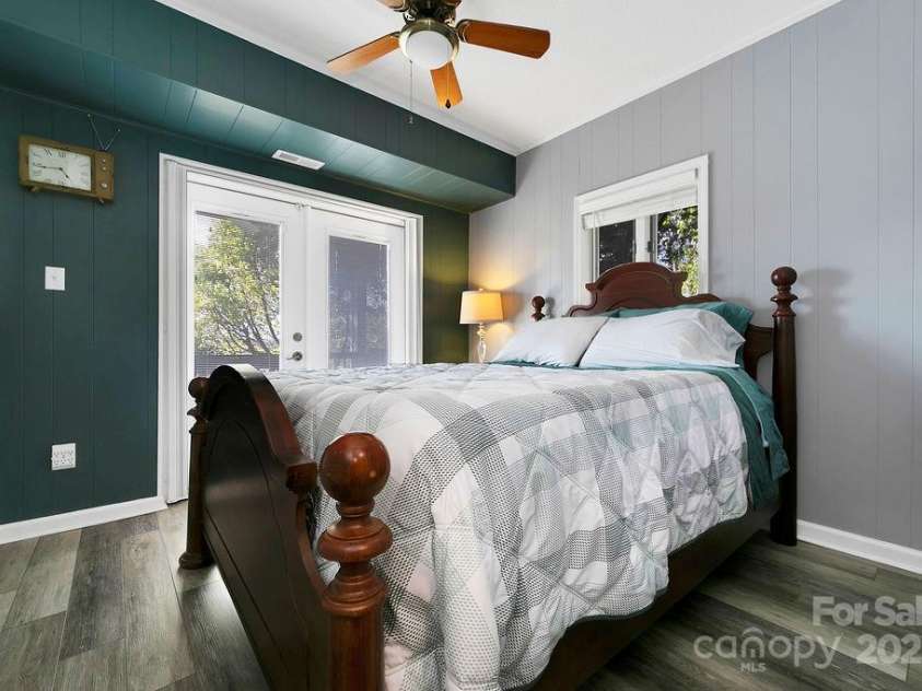 259 Dvdegi Court, Brevard, NC 28712.  MLS# CAR4248889, YatesRealty ID 22965. 2nd bedroom with french doors to the porch