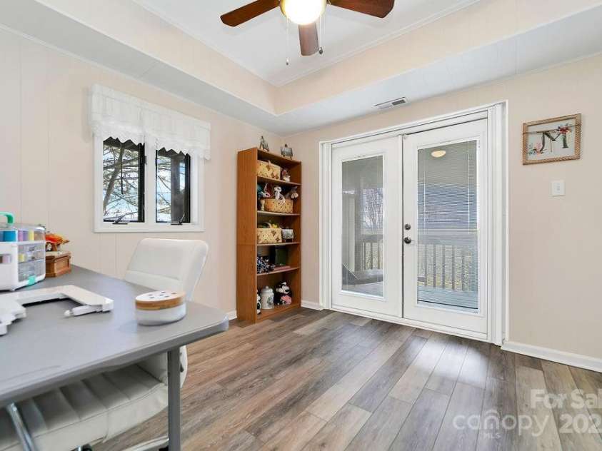 259 Dvdegi Court, Brevard, NC 28712.  MLS# CAR4248889, YatesRealty ID 22965. 3rd bedroom with french doors to porch