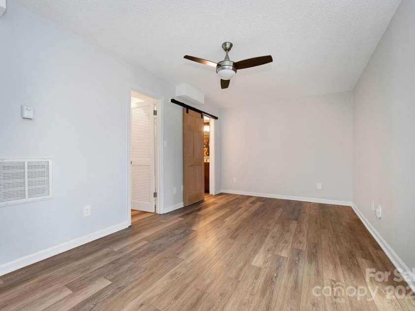 259 Dvdegi Court, Brevard, NC 28712.  MLS# CAR4248889, YatesRealty ID 22965. Basement level flexspace with storage and room for a mini kitchen