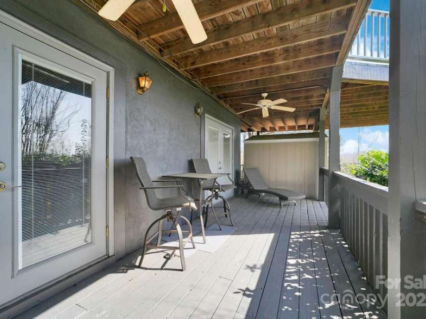 259 Dvdegi Court, Brevard, NC 28712.  MLS# CAR4248889, YatesRealty ID 22965. Basement level porch