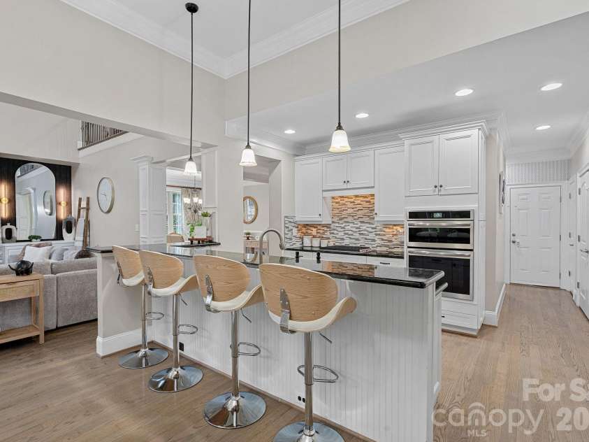 337 Bent Tree Drive, Stanley, NC 28164.  MLS# CAR4377289, YatesRealty ID 22965. Hosting is a breeze with barstool seating and openness. 