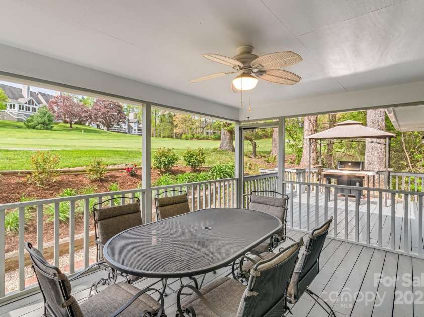 118 Broadmoor Drive, Flat Rock, NC 28731.  MLS# CAR4275218, YatesRealty ID 22968. Feel at home with nature in this large screened in porch .