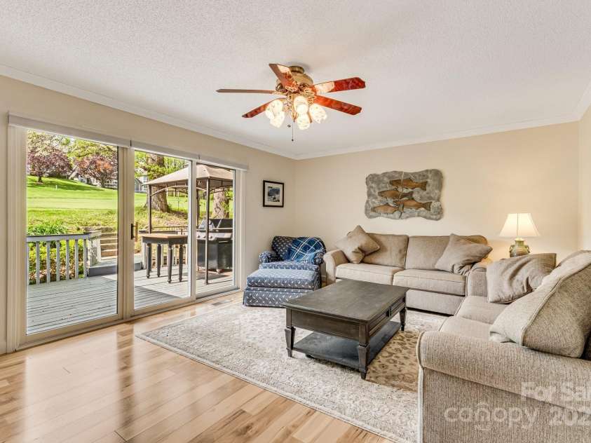 118 Broadmoor Drive, Flat Rock, NC 28731.  MLS# CAR4275218, YatesRealty ID 22968. Kick back and relax in the over-sized den.
