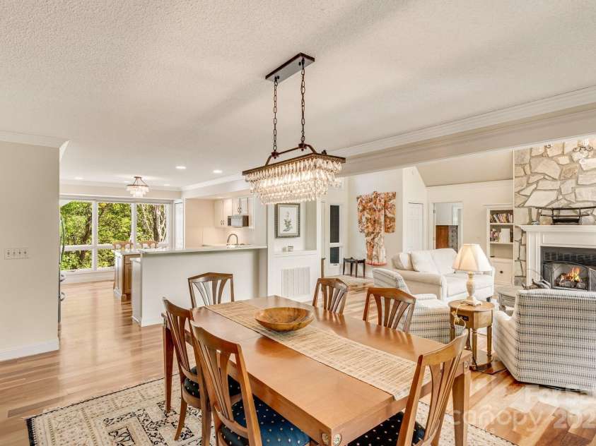 118 Broadmoor Drive, Flat Rock, NC 28731.  MLS# CAR4275218, YatesRealty ID 22968. Looking from the dining area to the newly reimagined 2024 kitchen.