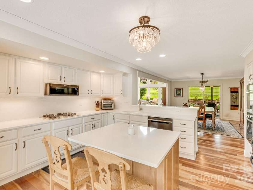 118 Broadmoor Drive, Flat Rock, NC 28731.  MLS# CAR4275218, YatesRealty ID 22968. The walk-in pantry is to the left.